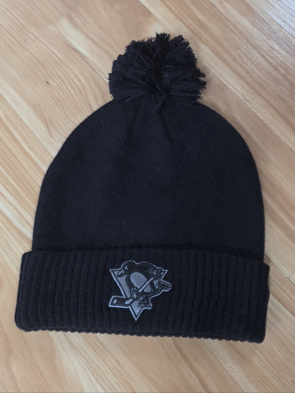 NHL Black Pom Cuffed Beanie with Team Crest